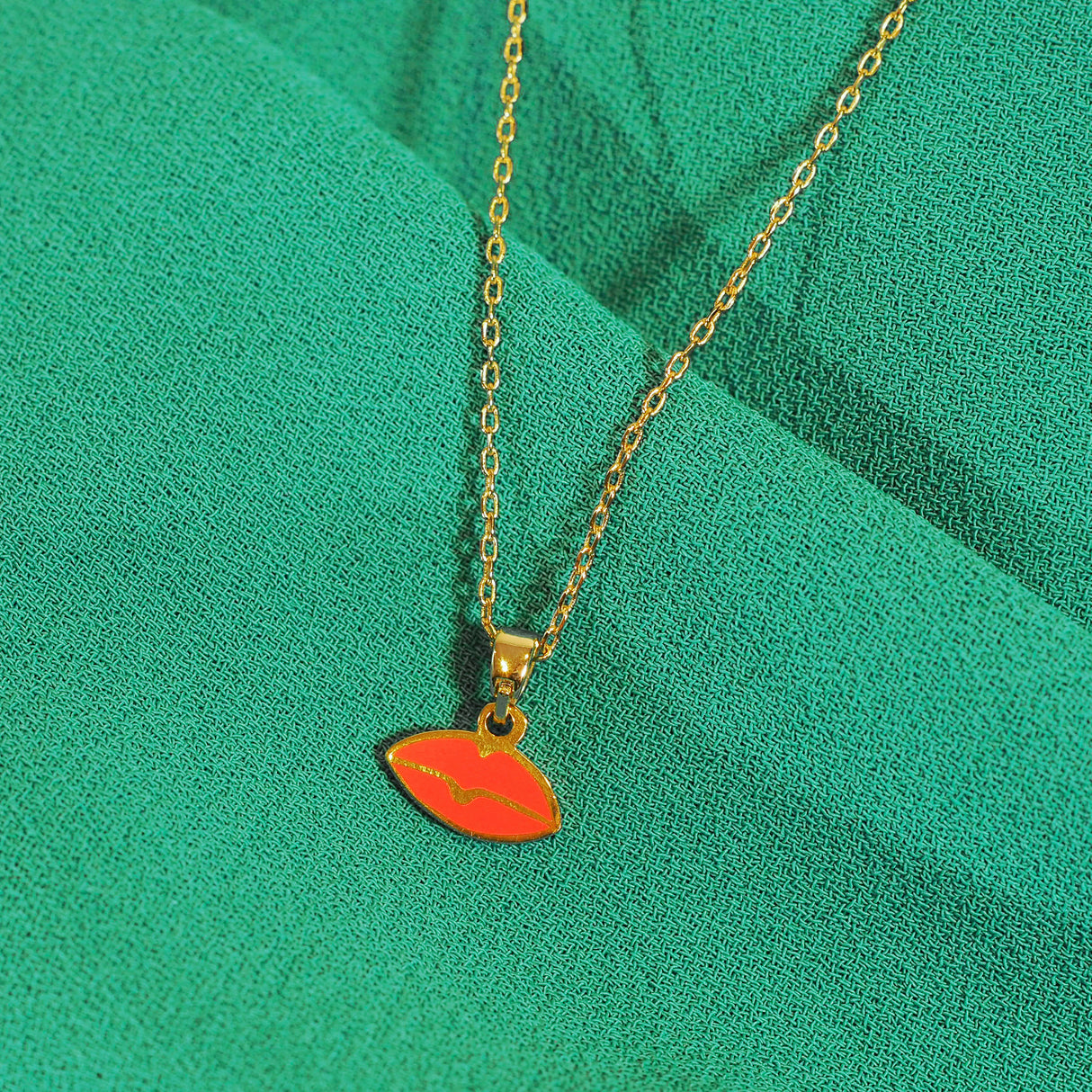 Eye/Lips Two-Sided Pendant