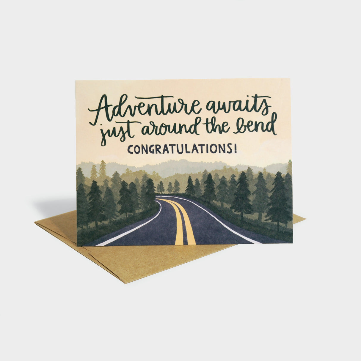 Greeting card with illustration of a road through a forest.