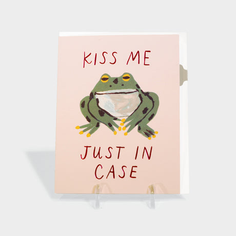 Greeting card with illustrated frog motif.