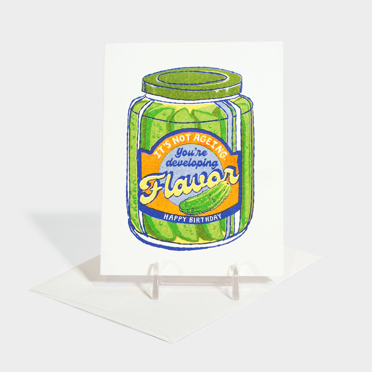 Greeting card with risograph illustration of a pickle jar.