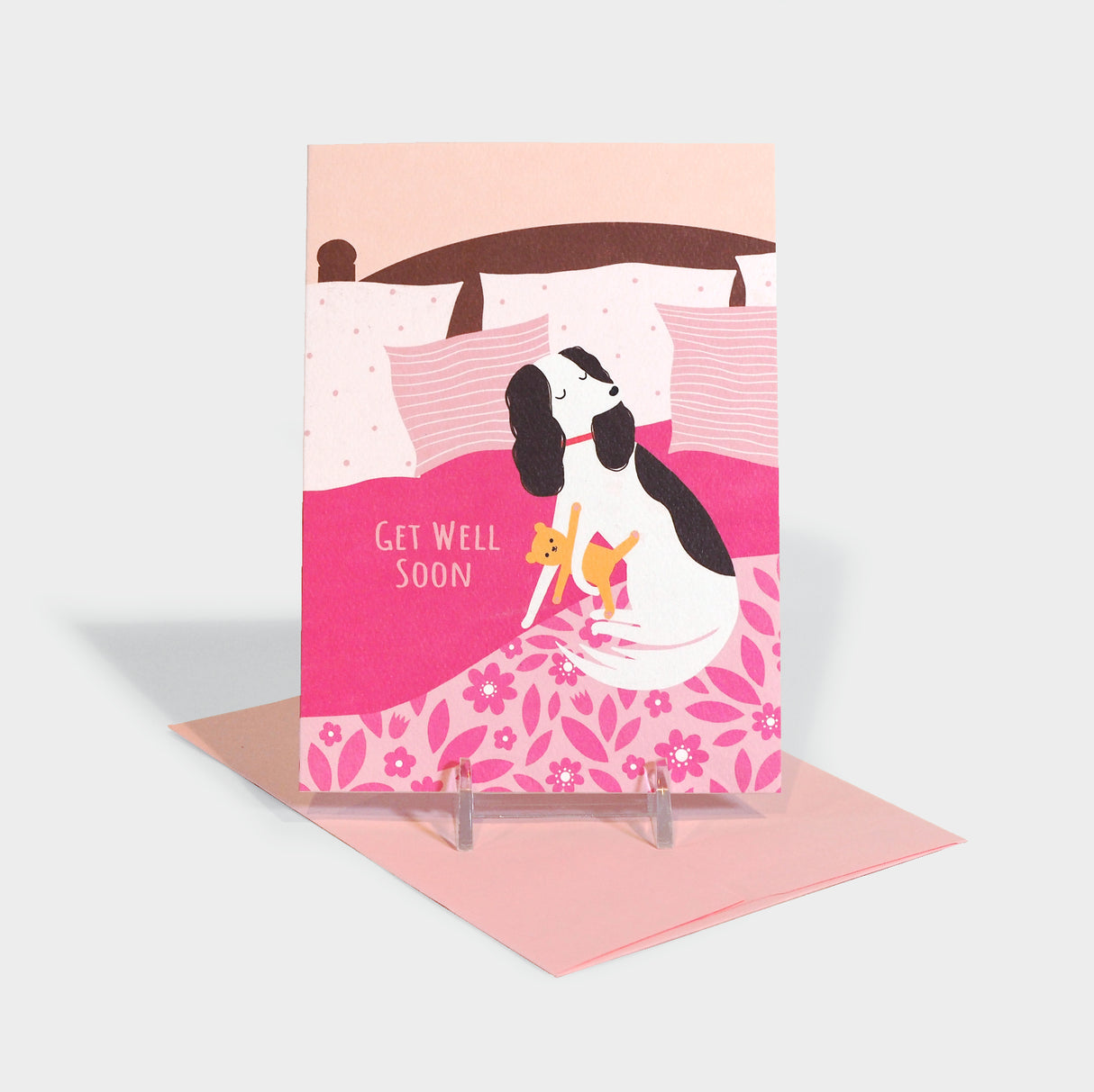 Dog on Bed Greeting Card