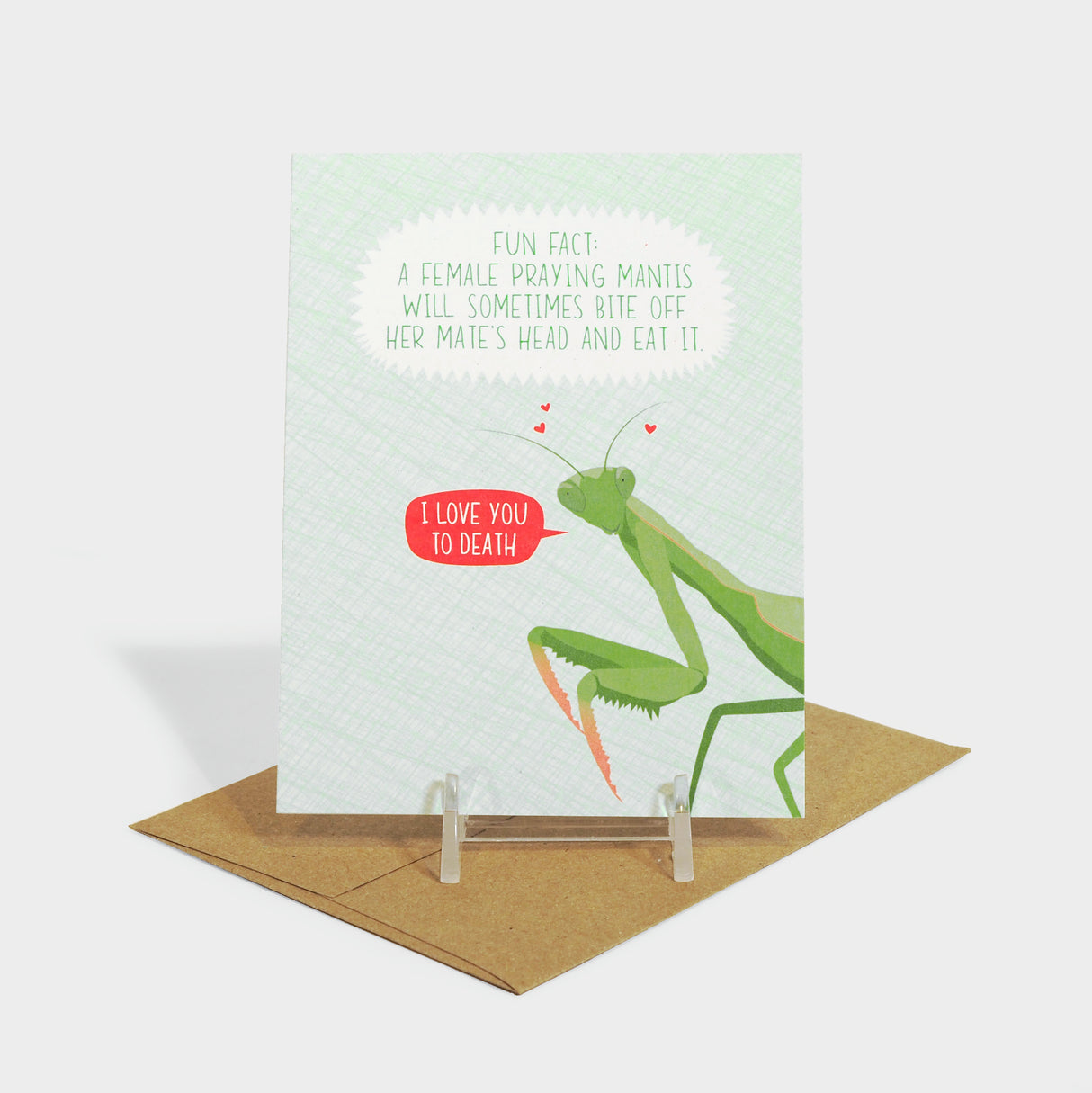 Greeting card with illustration of a preying mantis with hearts above its head.