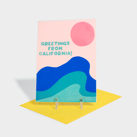 Greeting card with sun and ocean waves illustration.