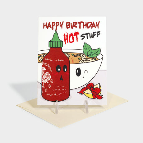 Greeting card with illustration of ramen and a bottle of hot sauce.