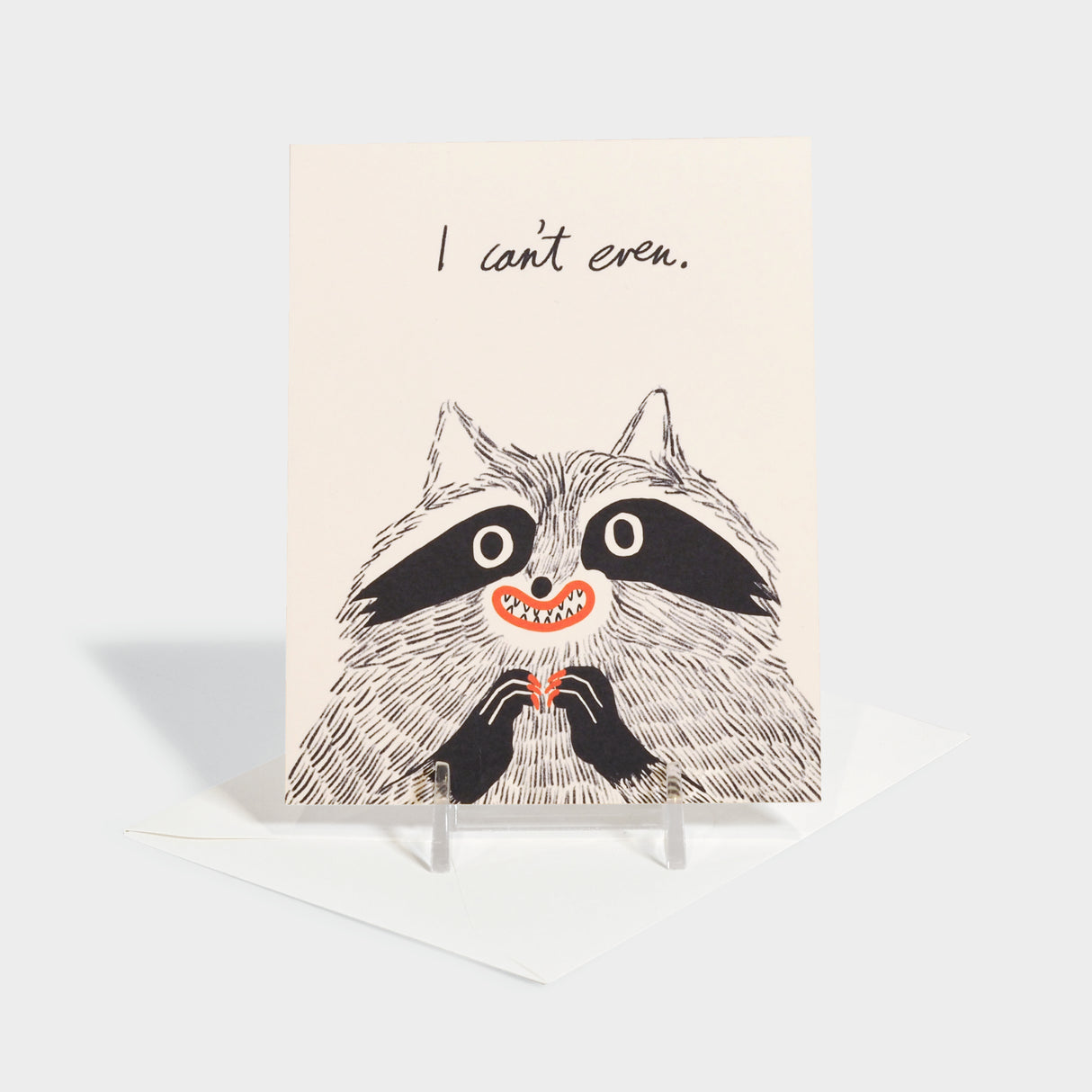 Greeting card with raccoon illustration. Inside also features a raccoon illustration.