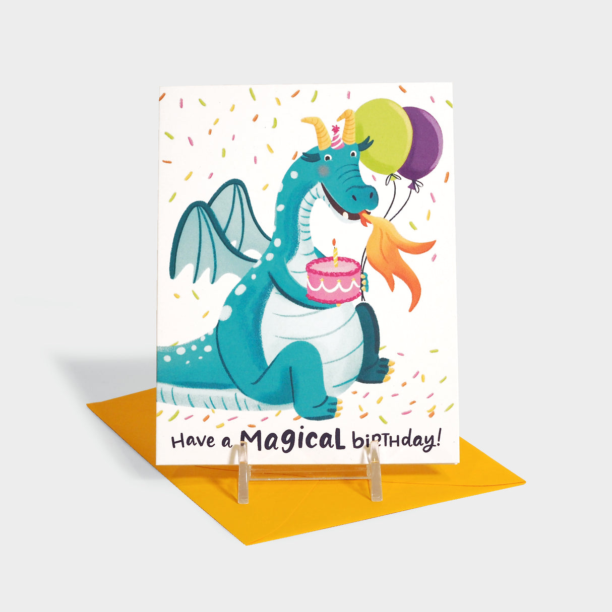 Greeting card with dragon holding balloons and a birthday cake.