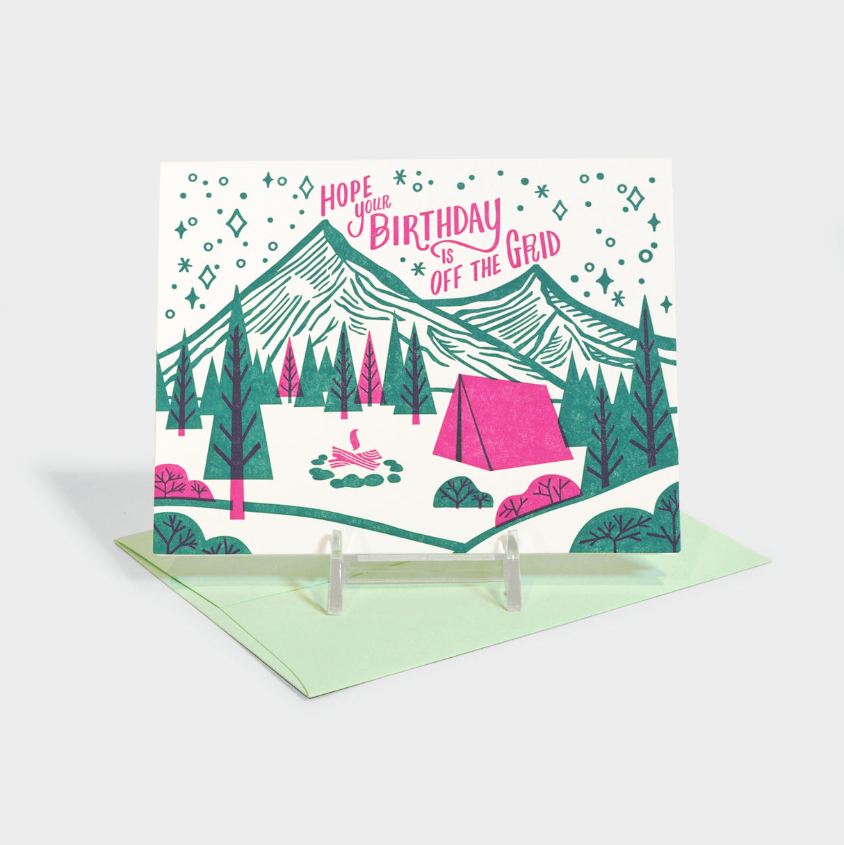 Letterpress card featuring a tent in a campground. 