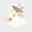 Greeting card with raven and persimmon motifs.