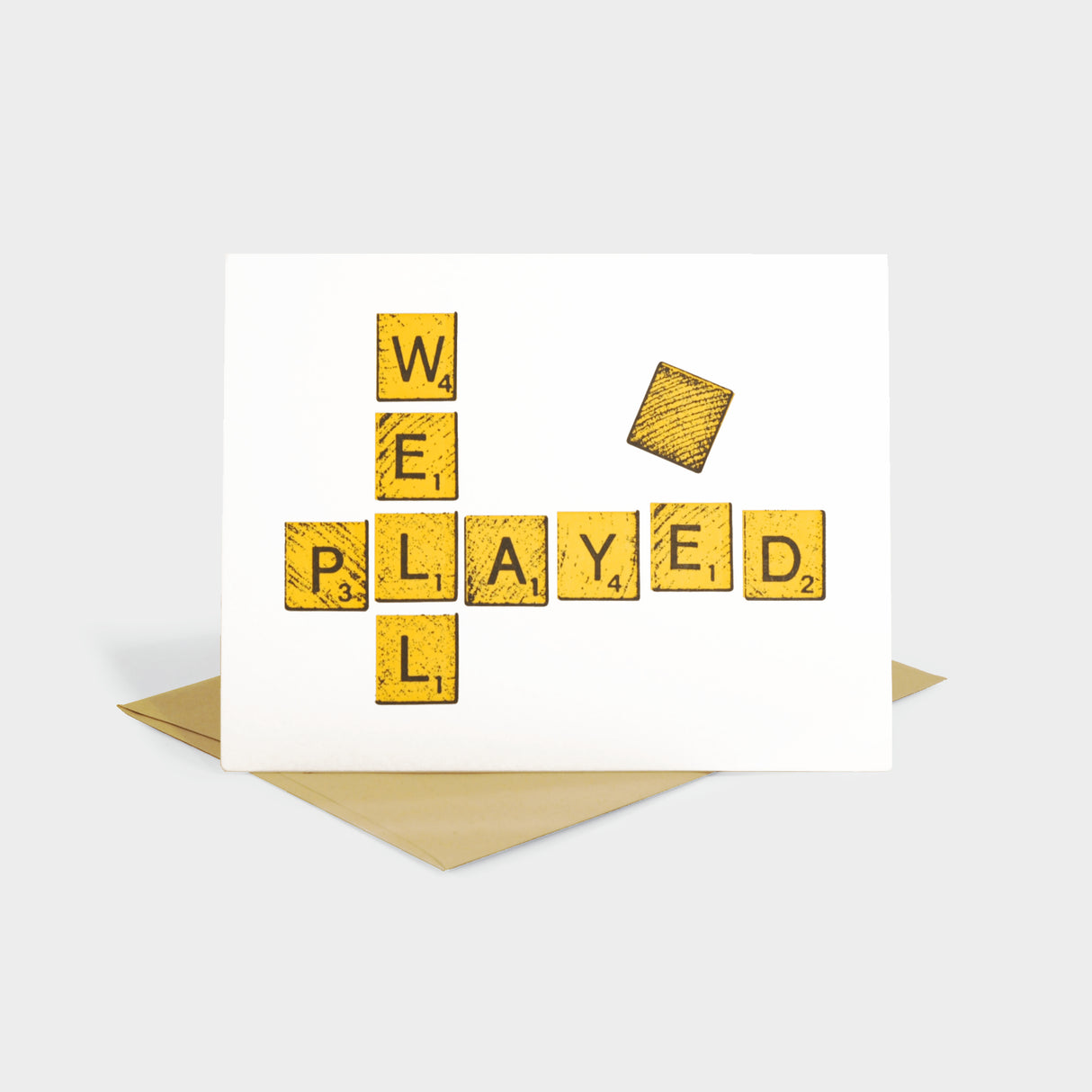 Greeting card with text spelled in scrabble tiles.