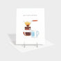 Greeting card with illustration of a coffee maker and mug.