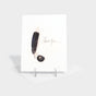 Greeting card with illustration of a feather quill and ink well.