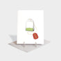 Greeting card featuring an illustration of a tea bag with a tag that reads, "teas the season."